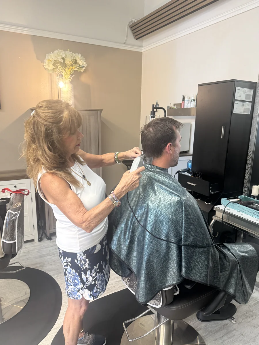 Carol giving a precision cut